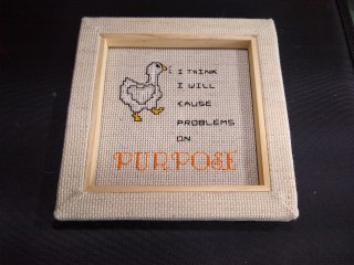 Untitled Goose Embroidery Counted cross stitch of a white goose and the words 'I think I will cause problems on PURPOSE'