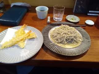 Cold soba and fried shrimp Shrimp tempura (fried shrimp) and cold soba (buckwheet noodles on a plate)