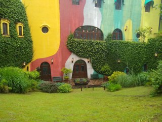 Outside the Ghibli Museum A view through the rain of the outside of the Ghibli Museum.