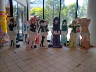 An assortment of anime cut-outs An assortment of anime cut-outs of girls, all dressed in the same school uniform