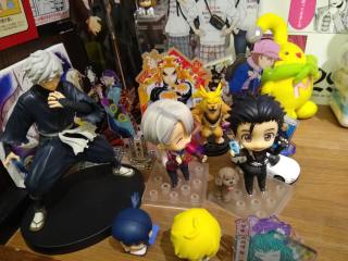 These Are A Few Of My Favorite Things... A small collection of anime and manga collectibles, featuring small statues of Viktor and Yuri (and Makkachin) from YURI ON ICE